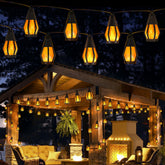 Jnaurb solar flame string lights glow softly for outdoor evenings.