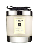 Jo Malone English Pear & Freesia candle close-up showing inviting aroma and luxe design.