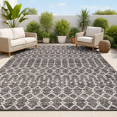 JONATHAN Y Ourika Moroccan rug on a porch blends boho charm with outdoor durability.