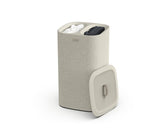Joseph Joseph Tota 60L laundry hamper with dual compartments for easy light and dark separation.
