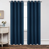 Joydeco navy blackout curtains block light for restful mornings.