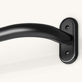 JRZOO wrap-around curtain rod in matte black blocks light and enhances privacy.