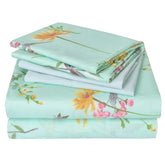 JSD Green Floral Queen flat sheet laid out for a refreshed bedroom look and easy bed-making.