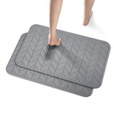 JUERLEN diatomaceous earth shower mat 2-pack for fast water absorption and dry floors.