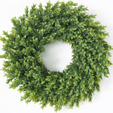Juxdp 26-inch artificial boxwood wreath on front door for welcoming, low-maintenance decor.