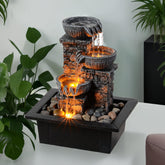 Kalona tabletop fountain castle waterfall enhances desk ambience with soothing cascade.