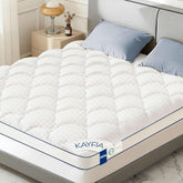 Kayfia 3-Inch Queen Mattress Topper on bed for cloud-soft comfort and support.