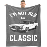 Kazdan over-the-hill blanket with humorous text for milestone celebrations.