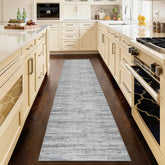 Kearoat hallway runner in blue-gray abstract design, enhancing entryway safety and style.