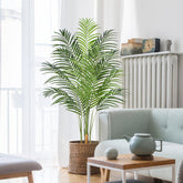 Keeplush 5ft artificial palm tree indoors with lush leaves for maintenance-free tropical vibe.