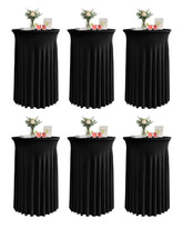 KeyWave cocktail table skirt on a black highboy for a sleek event look.