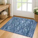 KILOCOCO entryway rug 2x3 with blue geometric design catches dirt at door.