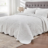 Kingnex oversized king bedspread 128x120 laid on bed for a clean, elegant look