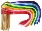 Kingsnow colorful ribbon wands create a rainbow wedding send-off moment.