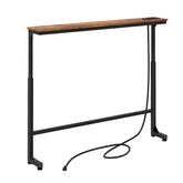 Kitstorack narrow console behind sofa shows space-saving arrangement for living rooms.