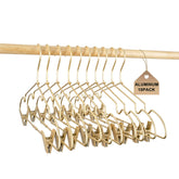 Koobay 12.5-inch gold metal baby clothes hanger with contoured shoulders for shape retention.