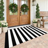 KOZYFLY black and white striped rugβ4x6 ft, ideal for indoor outdoor entryways with lasting color.