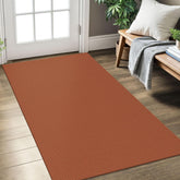 KOZYFLY entryway rug in orange-tan braided texture helps prevent slips