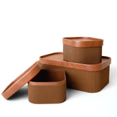 La Jolie Muse fluted storage basket with lid in chocolate brown.