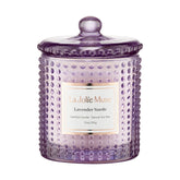 LA JOLIE MUSE Lavender Suede Candle in hobnail jar for calming ambience.