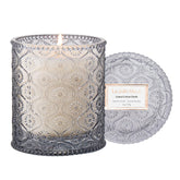 LA JOLIE MUSE Linen Cotton Oasis candle in embossed jar enhances home decor with subtle fragrance