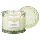 LA JOLIE MUSE Pistachio Macaron Candle jar shows a reusable glass vessel for décor