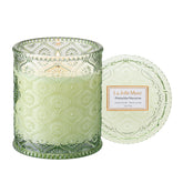LA JOLIE MUSE Pistachio Macaron candle in a glass jar for cozy dessert-inspired ambiance.