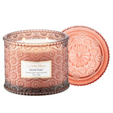 LA JOLIE MUSE Santal Rosé candle with embossed jar enhances elegant ambience
