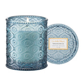 LA JOLIE MUSE Santorini Salt Air candle in embossed jar enhances coastal décor.