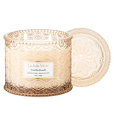 LA JOLIE MUSE Vanilla Bomb Candle jar front glowing for cozy ambiance