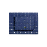 Lacoste Slice sheet set close-up showing breathable 100% cotton percale in vintage indigo.