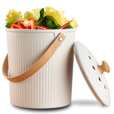 LALASTAR countertop compost bin with lid in cream for fresh kitchen odor control.