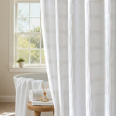 Lameirose white shower curtain with waffle stripe texture adds subtle depth to your bath
