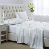 Lanest Housing Silk Satin Sheets in ivory showcase hotel-grade gloss and silky softness.