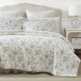 Laura Ashley king quilt set with floral reversible pattern offers two looks and cozy warmth.