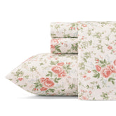 Laura Ashley queen sheet set in Lilian Coral offers silky sateen and breathable comfort.
