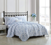 Laura Ashley Walled Garden Blue quilt set closeup showing floral print for a refined bedroom