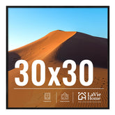 LaVie Home 30x30 black picture frame mounted on wall for versatile decor display.