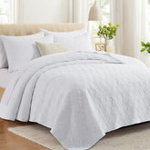 Lavsiry white king-size quilt coverlet offers lightweight comfort with a clean, fresh look.