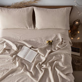 LBRO2M linen sheet flat on bed showing natural flax color and soft feel