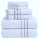 Le fil blanc bath towels set displayed on rack, plush and absorbent for daily use.