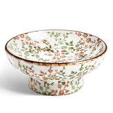 LE TAUCI 10-inch ceramic decorative bowl highlights vintage charm on any counter.