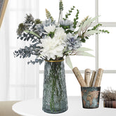 Leftover fake flowers in vase centerpiece brightens dining room with low maintenance