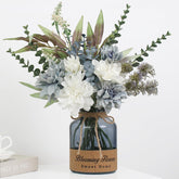 Leftover faux flowers in a vase add lasting color to your living space.