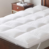 LeWinBedding 3-inch topper close-up shows plush goose feather fill for contour support.