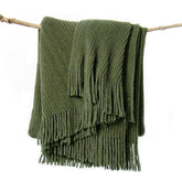 Lifein olive green throw on couch, cozy decorative blanket