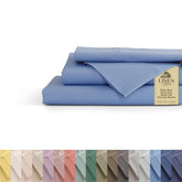 Linen Home baby blue percale flat sheet on king bed for cool nights.