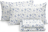 Linen Market twin sheets on bed with light blue floral for a fresh sleep setup