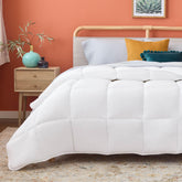 Linenspa white down-alternative comforter front view highlighting all-season warmth