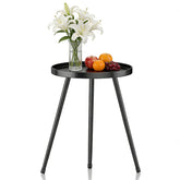 LMGVRZK round side table in black iron, ideal for cozy living spaces.